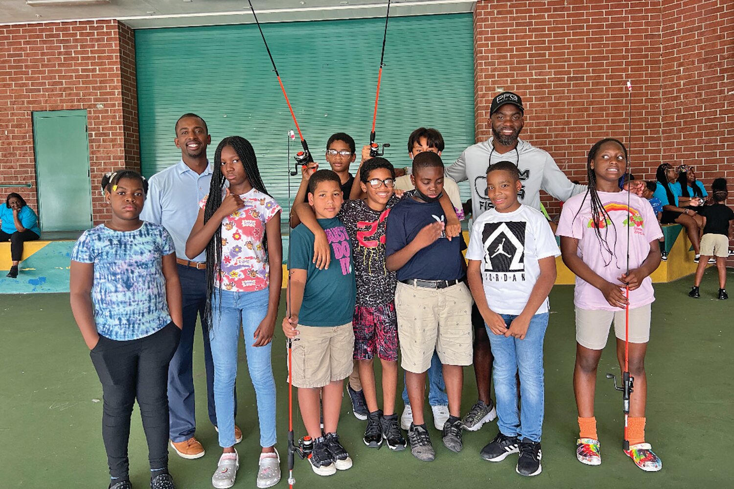 Recently, U.S. Sugar Community Relations Director Brannan Thomas (back row far left) joined Jeffery Willis, known as Muck City Angler (back row far right) in the MCA youth fishing camp at Pioneer Park Elementary School in Belle Glade.